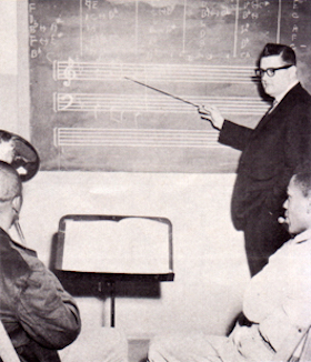 Musical Director Robert Barclay instructing musicians