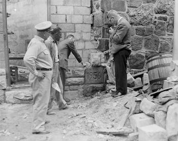 ​​​​Mortar being placed around cornerstone of Cellblock 15 (Death Row), 1956; Photo: collection of Eastern State Penitentiary Historic Site, gift of Alan J. LeFebvre. 