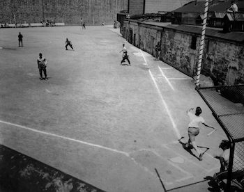 Prisoners playing baseball on the field between Cellblocks 3 and 4. Photo: collection of Eastern State Penitentiary Historic Site, gift of Jack Flynn.