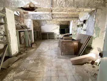 Empty dusty room, Eastern State's abandoned dental lab