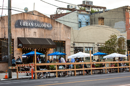 People dining outside at Urban Saloon