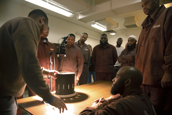 Guest instructor Lowell Boston teaches student filmmakers zoetrope animation during classes at the Pennsylvania State Correctional Institution at Chester.