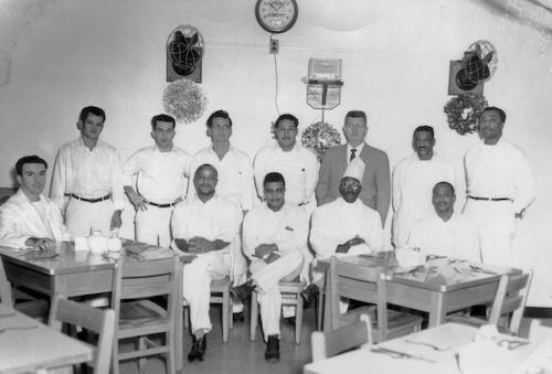 Prisoners with Warden Joseph Brierley in the Officers’ Mess (Dining) Hall, c. 1966, Norman Maisenhelder seated far left; Photo: collection of Eastern State Penitentiary Historic Site, courtesy of Norman Maisenhelder's daughter.