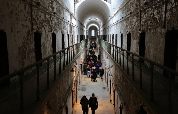 An interior image of an old cell block within Eastern State, from the second floor.